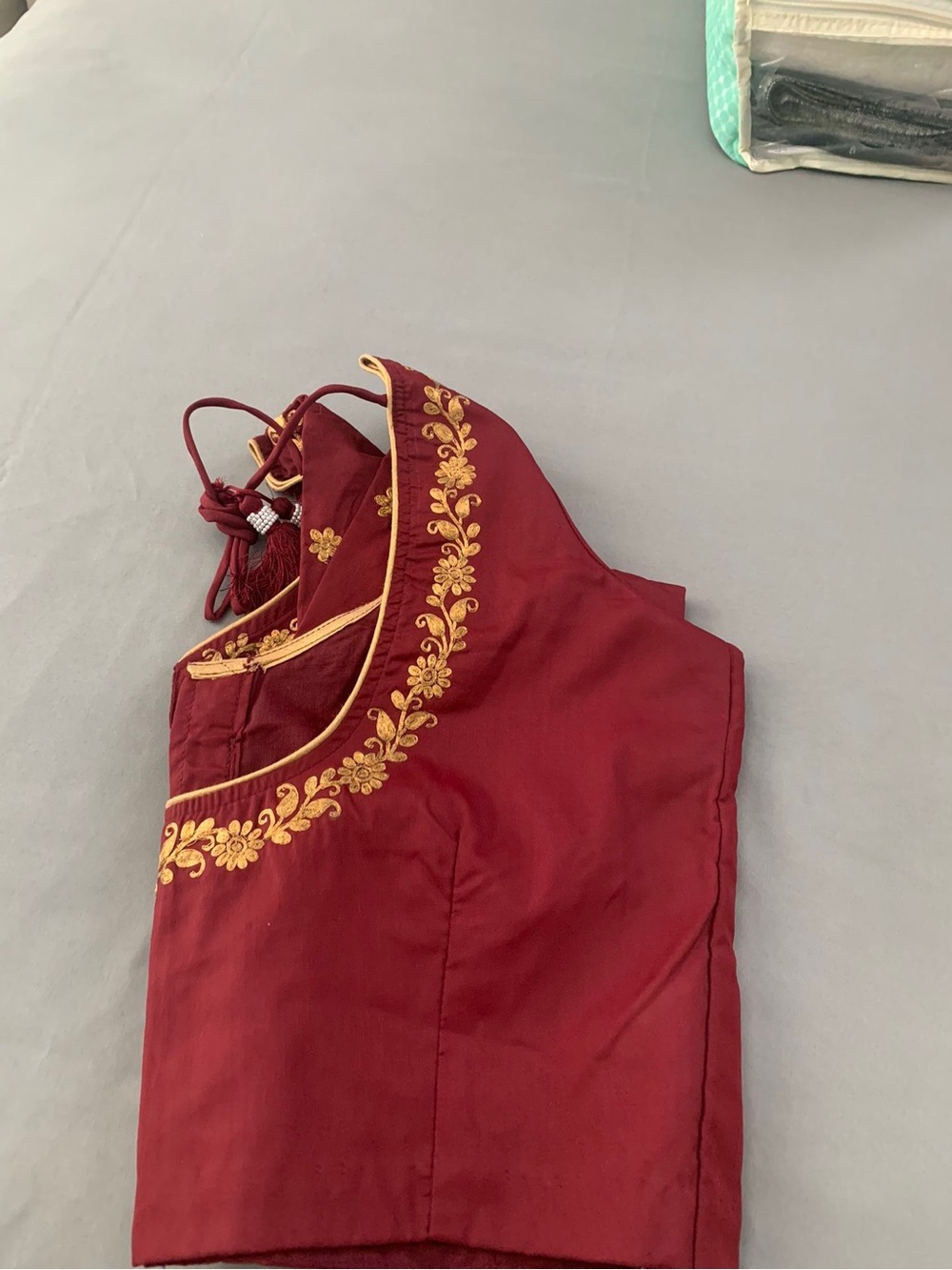 Embroidered Maroon Sleeveless Blouse with Gold Trim